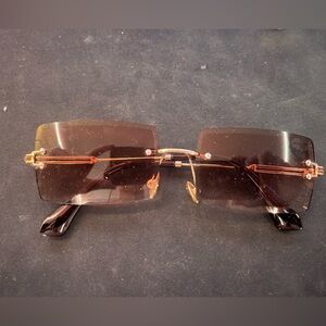 Men’s gold sunglasses